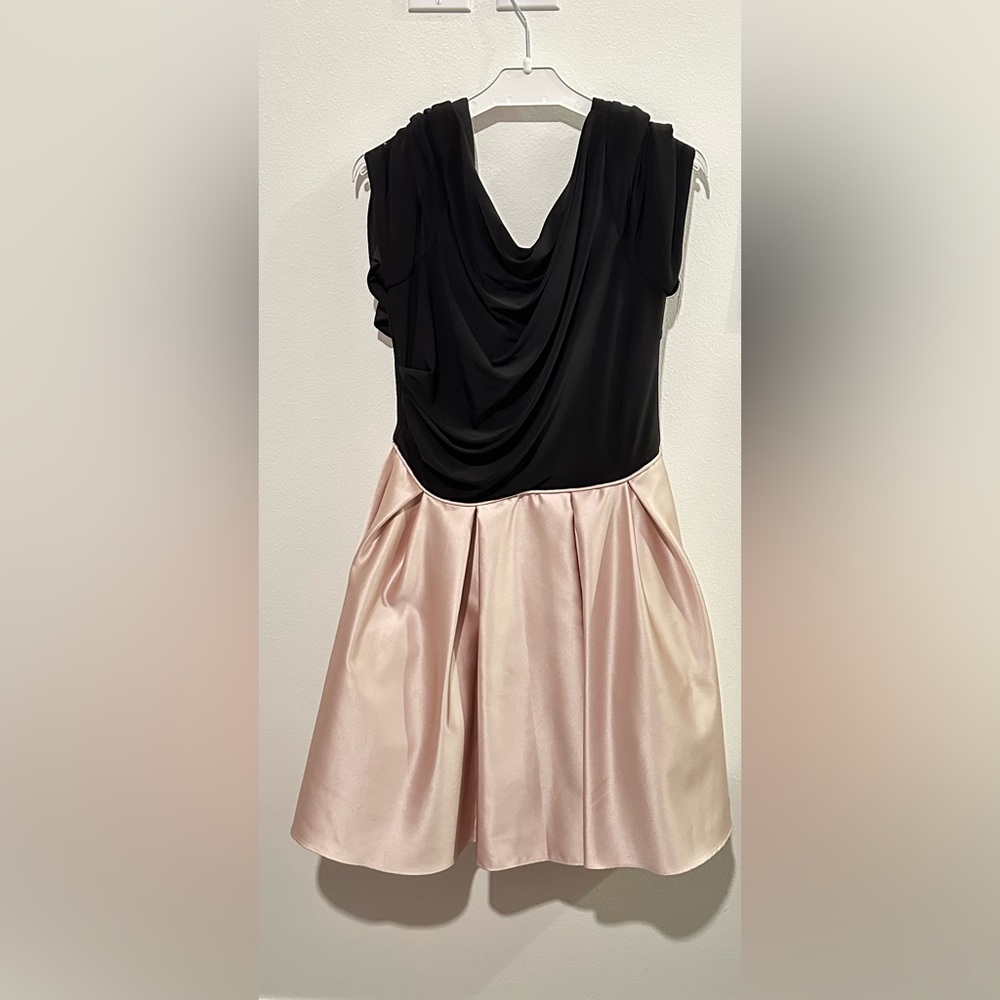 This Betsy Adam dress is a size 8 that has only been worn once.